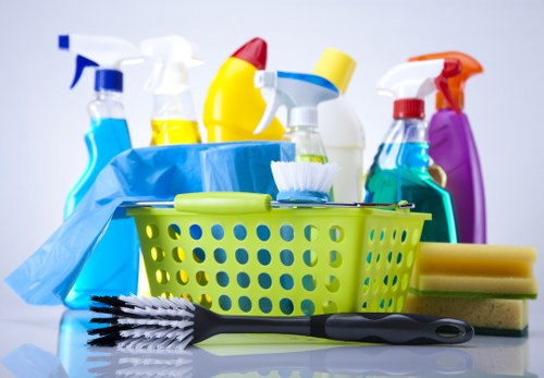 Cleaners reviewing a complaint procedure in a professional setting
