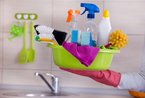 Professional cleaner preparing a safe cleaning setup in Tooting