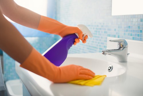 Local technician assessing a stubborn stain in Tooting