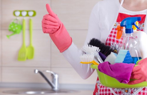 Local cleaning team preparing equipment for detailed home cleaning in Tooting