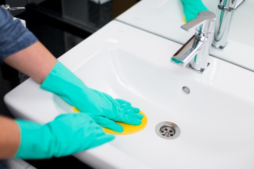 Preparation checklist and cleaning equipment for a builders clean in Tooting